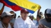 FILE - Venezuelan opposition presidential candidate Edmundo Gonzalez Urrutia greets supporters upon his arrival at the campaign act in Barlovento Town in Miranda State, Venezuela, on June 26, 2024.