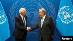 欧洲联盟外交政策主管博雷利(Josep Borrell，左）2022年9月18日在纽约会见联合国秘书长古特雷斯。（路透社）