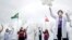 Des infirmières lors d'une manifestation demandant des vaccins contre la COVID-19, à Brasilia, au Brésil, le 7 avril 2021.