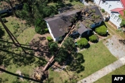 An aerial picture taken on Sept. 28, 2024, shows storm damage in the aftermath of Hurricane Helene in Valdosta, Georgia.