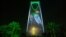 FILE - In this photo taken Sept. 24, 2017, and released by the Saudi Culture and Information Ministry, an image of King Salman and Crown Prince Mohammed bin Salman are projected on the Kingdom Tower in Riyadh, Saudi Arabia. A court in Saudi Arabia sentenced a columnist to five years in prison for insulting the Saudi royals.