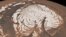 This image from two instruments aboard NASA’s Mars Global Surveyor, depicts an orbital view of the north polar region of Mars. New findings from the Mars Reconnaissance Orbiter have revealed subsurface geology in this region.