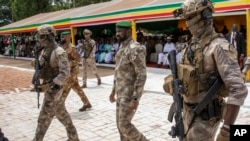 FILE - The leader of Mali's junta Col. Assimi Goita, attends an independence day military parade in Bamako, Sept. 22, 2022.