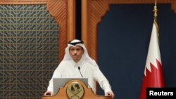 FILE - Qatar's Prime Minister and Foreign Minister Sheikh Mohammed bin Abdulrahman Al Thani attends a joint press conference with French Foreign Minister Catherine Colonna (not pictured) at the Amiri Diwan, in Doha, Qatar November 5, 2023.