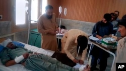 A victim in a bus accident is treated at a hospital in Chilas, northwest Pakistan, Sunday, Sept. 22, 2019. 