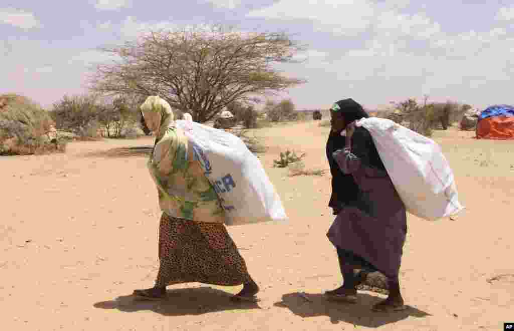 SOMALIA: Drought and famine force populations to seek refuge in UNHCR camps such as Dollow, where they can receive food aid. AP Photograph taken during the Muslim holiday of Eid al-Fitr, Aug. 30, 2011.&nbsp;