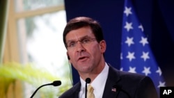 U.S. Defense Secretary Mark Esper speaks at a press conference with French Defense Minister Florence Parly in Paris, Sept. 7, 2019. On Thursday, Esper announced the military would make election security part of its mission.