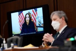 Democratic vice presidential candidate Sen. Kamala Harris, D-Calif., speaks virtually during a confirmation hearing for Supreme Court nominee Amy Coney Barrett before the Senate Judiciary Committee, Oct. 12, 2020; Sen. John Kennedy, R-La., listens.