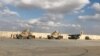 خودروهای نظامی سربازان آمریکایی در پایگاه هوایی عین الاسد در استان الانبار، عراق (آرشیو)