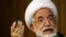 FILE - Iranian opposition leader Mahdi Karroubi, the father of Mohammad Taghi Karroubi and Mohammad Hossein Karroubi, has been under house arrest in Iran since 2011 for supporting protests against the results of the country’s 2009 presidential election.