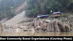 Chinese engineers doing test drilling for the Mong Ton Dam on the Salween River.