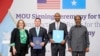 U.S. Assistant Secretary of State for African Affairs Molly Phee, Charge d'Affaires to the U.S. Embassy Shane Dixon, Defense Minister Abdulkadir Mohamed Nur and President Hassan Sheikh Mohamud attend the signing of a security pact in Mogadishu, Somalia, on Feb 15, 2024.