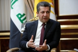 FILE - Masrour Barzani, prime minister of the Kurdistan Regional Government, speaks during an interview with Reuters in Irbil, Iraq, July 9, 2019.