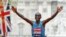 FILE - Eliud Kipchoge of Kenya wins the men's race in the 35th London Marathon, April 26, 2015. He also won the race the following year.