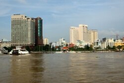Ho Chi Minh City, shown in 2009, is the business hub of Vietnam, which aims to cut emissions by requiring businesses to submit pollution data to the government.