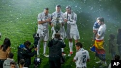 Les joueurs du Real Madrid célébrent leur victoire en finale de la Ligue des champions, le 29 mai 2016.