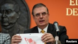 Mexico's Foreign Minister Marcelo Ebrard holds a news conference following talks with members of the Trump administration in Washington, Sept. 10, 2019.