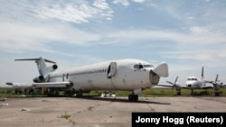 FILE—An abandoned aircraft stands at Kinshasa's Ndjili International Airport April 13, 2012.