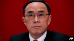 中国电信公司董事长兼中共党组书记常小兵2013年在香港的记者会上