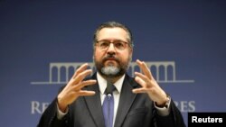 Brazil's Foreign Minister Ernesto Araujo gestures during a news conference at the Itamaraty Palace in Brasilia, July 2, 2019. 