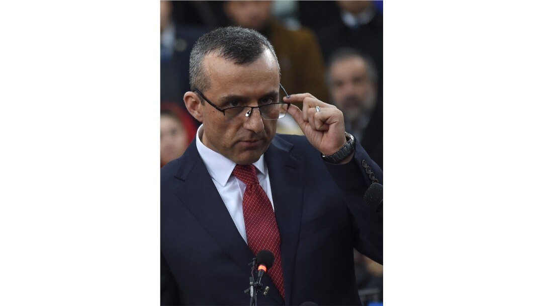 FILE - Then-first vice-presidential candidate Amrullah Saleh looks on as he speaks to the media after arriving at the Independent Electoral Commission office in Kabul on Jan. 20, 2019.