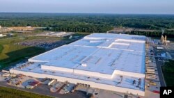 FILE - The Ultium Cell factory, a General Motors joint venture electric vehicle battery plant in Warren, Ohio, is seen July 7, 2023. Workers at an Ultium plant in Tennessee have voted to join the United Auto Workers, after workers in Ohio made a similar move in 2022.