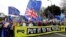 Demonstrators hold a banner during a Peoples Vote anti-Brexit march in London, March 23, 2019.