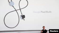 Google product manager Juston Payne speaks about Pixel Buds during a launch event in San Francisco, California, Oct. 4, 2017.