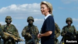 FILE - German Defense Minister Ursula von der Leyen visits the Transport Helicopter Regiment 30 in Niederstetten, Germany, Aug. 20, 2018. 