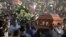 Mourners carry the coffin of slain mayor of Temixco, Gisela Mota, to the cemetery in Pueblo Viejo, Mexico, Jan. 3, 2016. 
