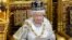 Britain's Queen Elizabeth delivers her speech in the House of Lords, during the State Opening of Parliament at the Palace of Westminster in London May 8, 2013. 