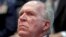 FILE - CIA Director John Brennan listens to remarks by President Barack Obama at the Director of National Intelligence Office to mark its 10th anniversary, in McLean, Virginia, April 24, 2015.