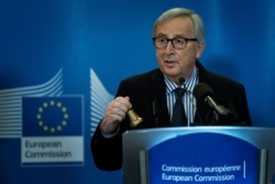 FILE - Former European Commission president Jean-Claude Juncker speaks in Brussels, Belgium, Dec. 3, 2019.