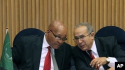 S. African President and Chairperson of the AU Committee on Libya, Jacob Zuma, left, talks with Ramtane Lamamra, African Union Commissioner for Peace and Security in Addis Ababa, Ethiopia, August 26, 2011.