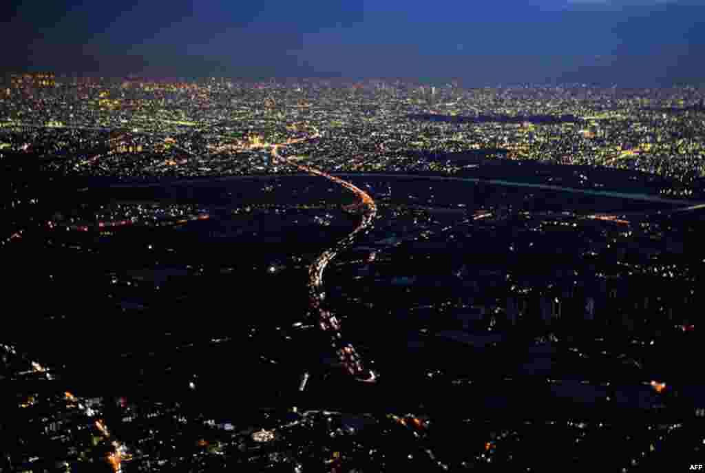 March 18: Lights are turned off during rolling blackouts in Misato City, Japan. Tokyo Electric Power Co. announced the rolling blackouts after its power generation was cut due to damage to its Fukushima Daiichi power plant, where it is struggling to preve