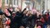 Protesters gesture during a demonstration by trade unions and workers, at a national strike demanding stronger public services in Brussels, Belgium, Feb. 13, 2025. 