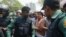 An opposition BNP activist is being arrested by policemen in Dhaka. In 2018, thousands of opposition leaders and activists were arrested in Bangladesh on allegedly trumped up cases of political violence.