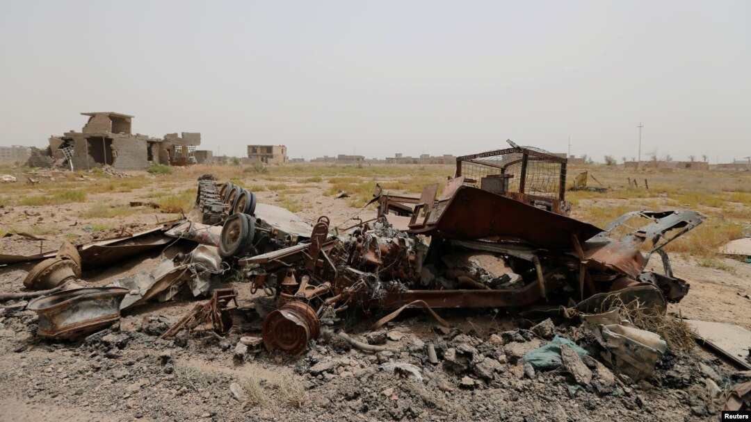 Military vehicle wreckage belonging to Islamic State militants is seen in Falluja, Iraq, June 18, 2016.