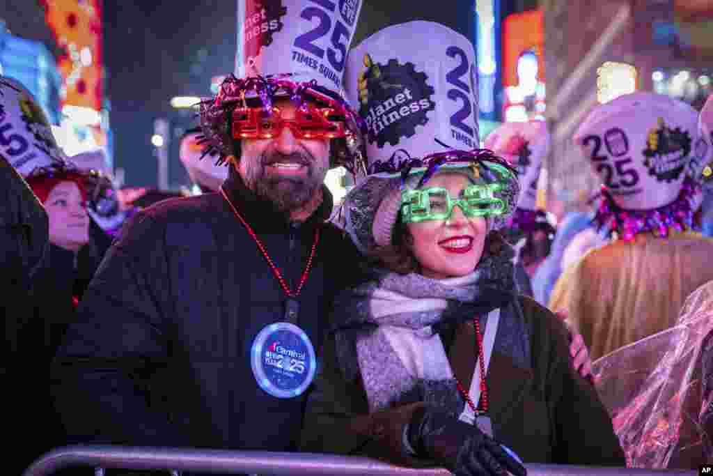 Revelers celebrate in New York&#39;s Times Square as they attend a New Year&#39;s Eve celebration, Dec. 31, 2024.