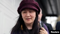 CFO Huawei Technologies Meng Wanzhou tiba di rumahnya usai menghadiri sidang di pengadilan Vancouver, British Columbia, Kanada, Rabu (6/3).