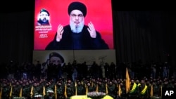 Pemimpin Hizbullah-Lebanon, Hassan Nasrallah memberikan pidato lewat televisi hari Kamis, 1 Agustus 2024. 