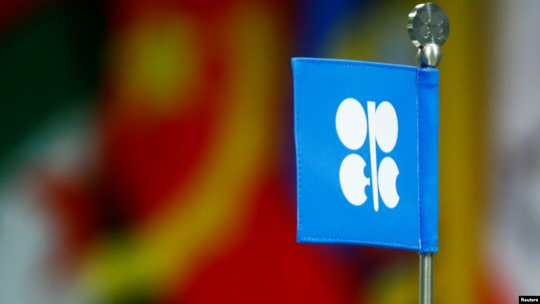FILE - A flag with the Organization of the Petroleum Exporting Countries (OPEC) logo is seen during a meeting of the Organization of the Petroleum Exporting Countries (OPEC) and non-OPEC producing countries in Vienna, Austria.