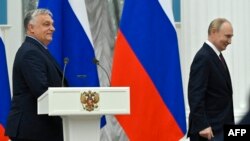 Russia's President Vladimir Putin and Hungary's Prime Minister Viktor Orban leave after delivering a joint press statement following their talks at the Kremlin in Moscow on July 5, 2024. (Photo by Alexander NEMENOV / AFP)