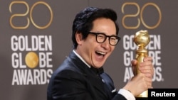 Ke Huy Quan poses with his award for Best Supporting Actor in a Motion Picture for "Everything Everywhere All at Once" at the 80th Annual Golden Globe Awards in Beverly Hills, California, Jan. 10, 2023.