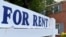 FILE - A for-rent sign sits in front of a home in Arlington, Va., June 8, 2021.
