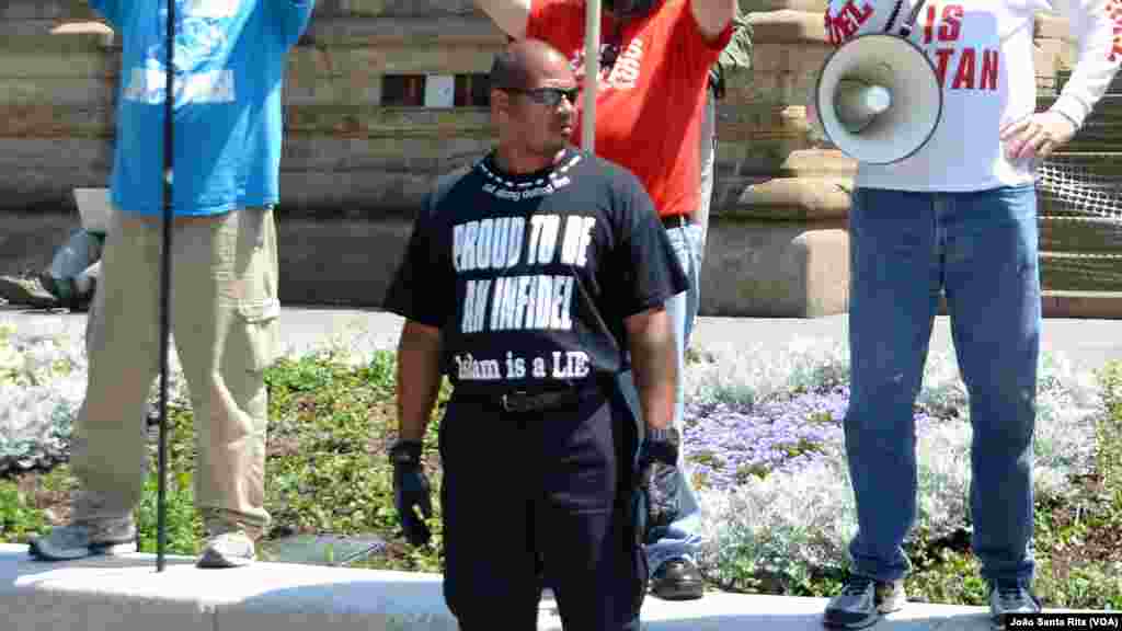 A protester showing a t-shirt saying: &quot;Proud to be an Infidel Islam is a lie&quot; outside the Republican Convention arena in Cleveland