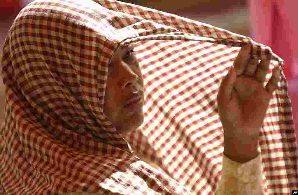 柬埔寨一位41岁的艾滋病患者参加世界艾滋病日活动。(Reuters)