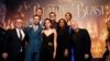 Director Bill Condon and composer Alan Menken pose with cast members Dan Stevens, Luke Evans, Emma Watson, Josh Gad, Audra McDonald and Gugu Mbatha-Raw at the premiere of "Beauty and the Beast" in Los Angeles, March 2, 2017. 