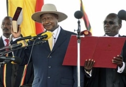 FILE - Ugandan President Yoweri Museveni is sworn in for another term at Kololo Airstrip in the capital city Kampala, May 12, 2011