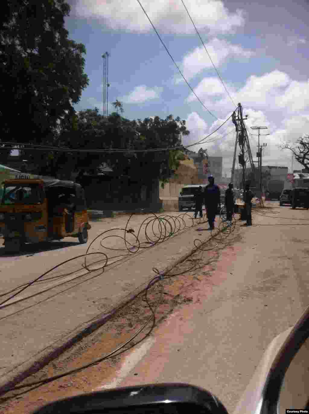 A photo, provided to VOA's Somali Service, shows the destruction of Naso-Hablod hotel and surrounding areas, in Mogadishu, Somalia, June 26, 2016. The photo was taken by a bystander who wished to remain anonymous.